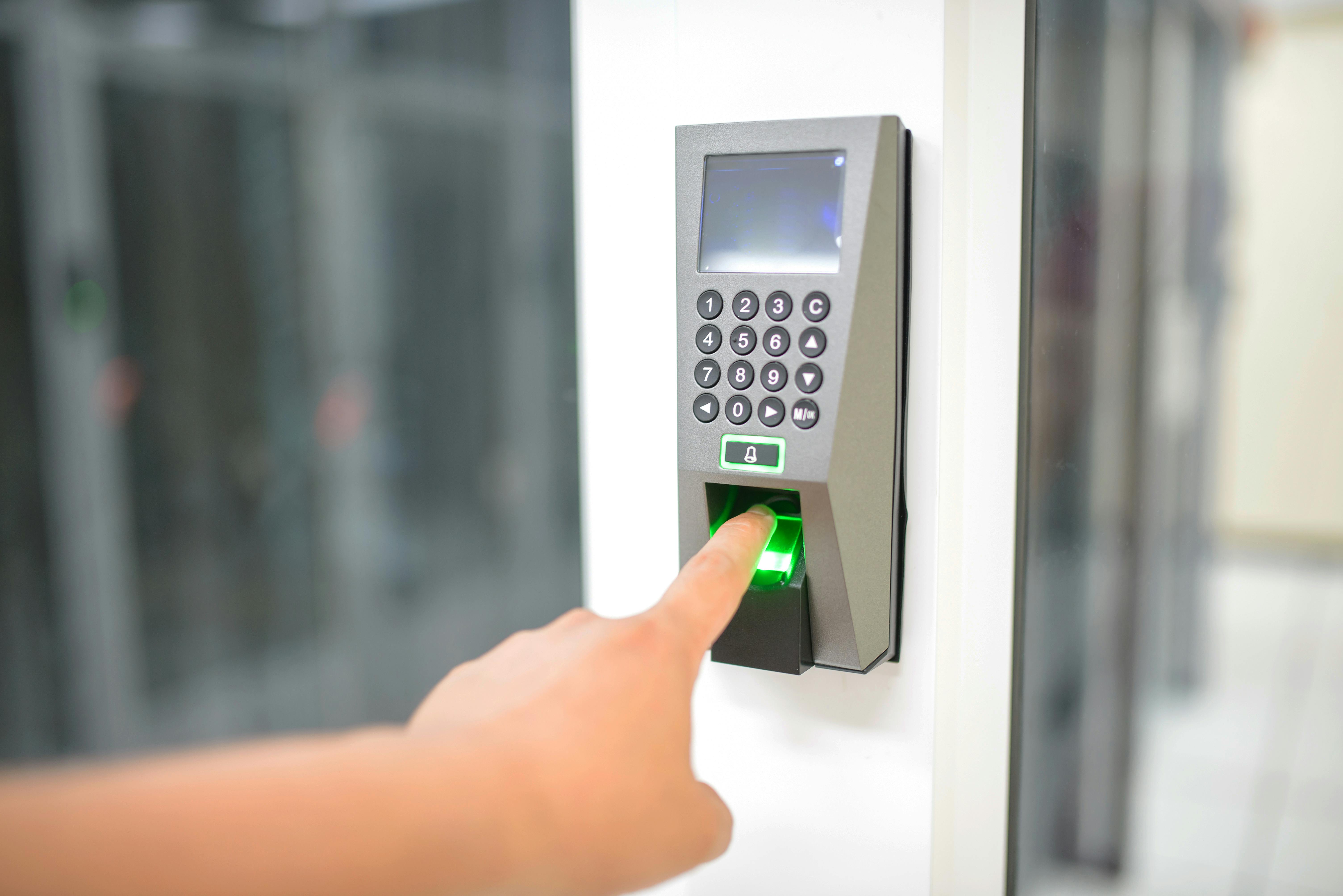 A close-up image of a finger scan, showcasing biometric security technology for employee access control in commercial spaces.