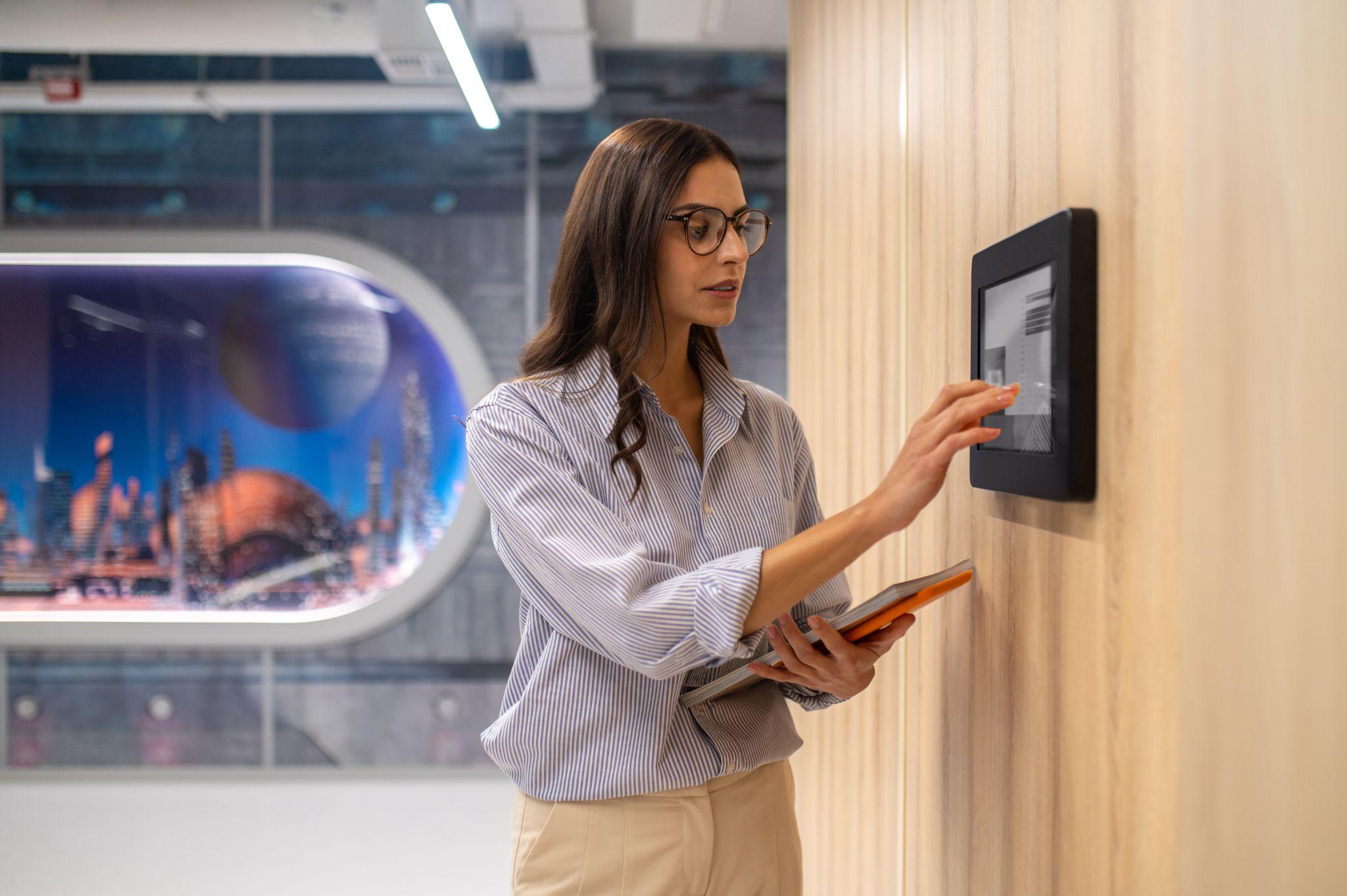 A person using an access control system for secure business entry.