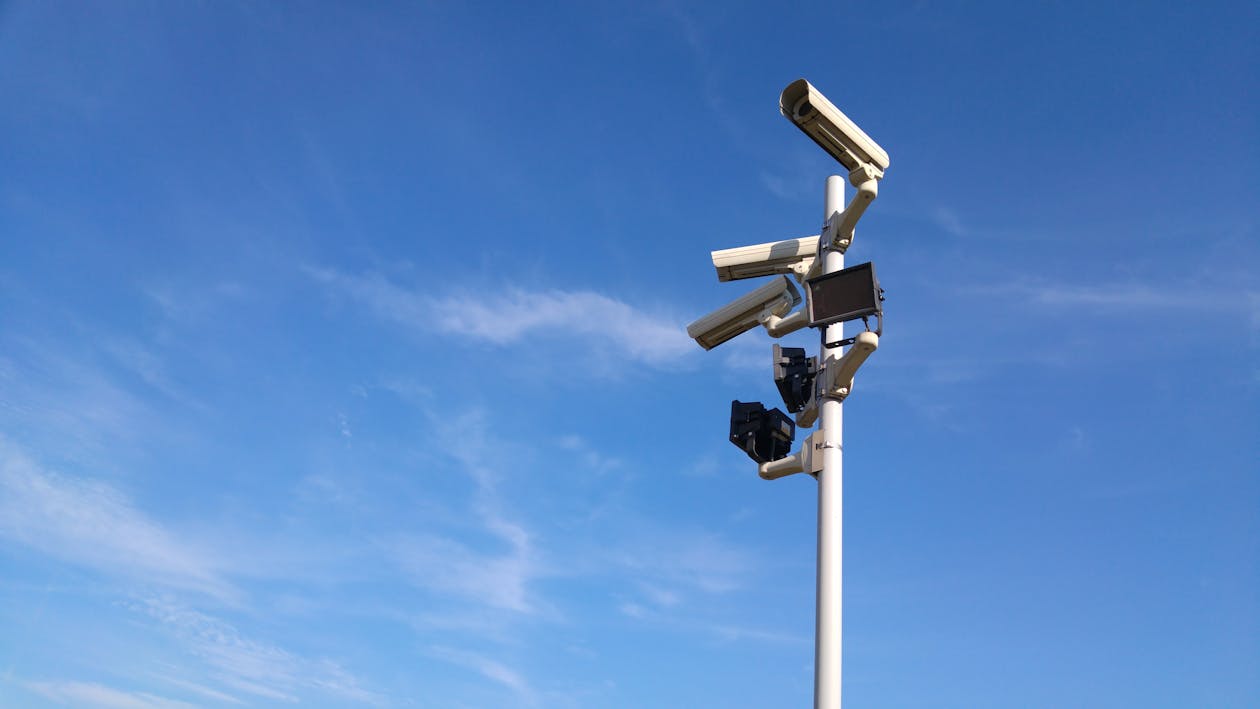 A pair of black and white CCTV cameras, illustrating the range of options available for surveillance systems.