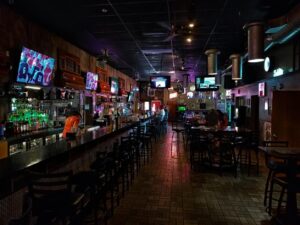 A sports bar with multiple televisions