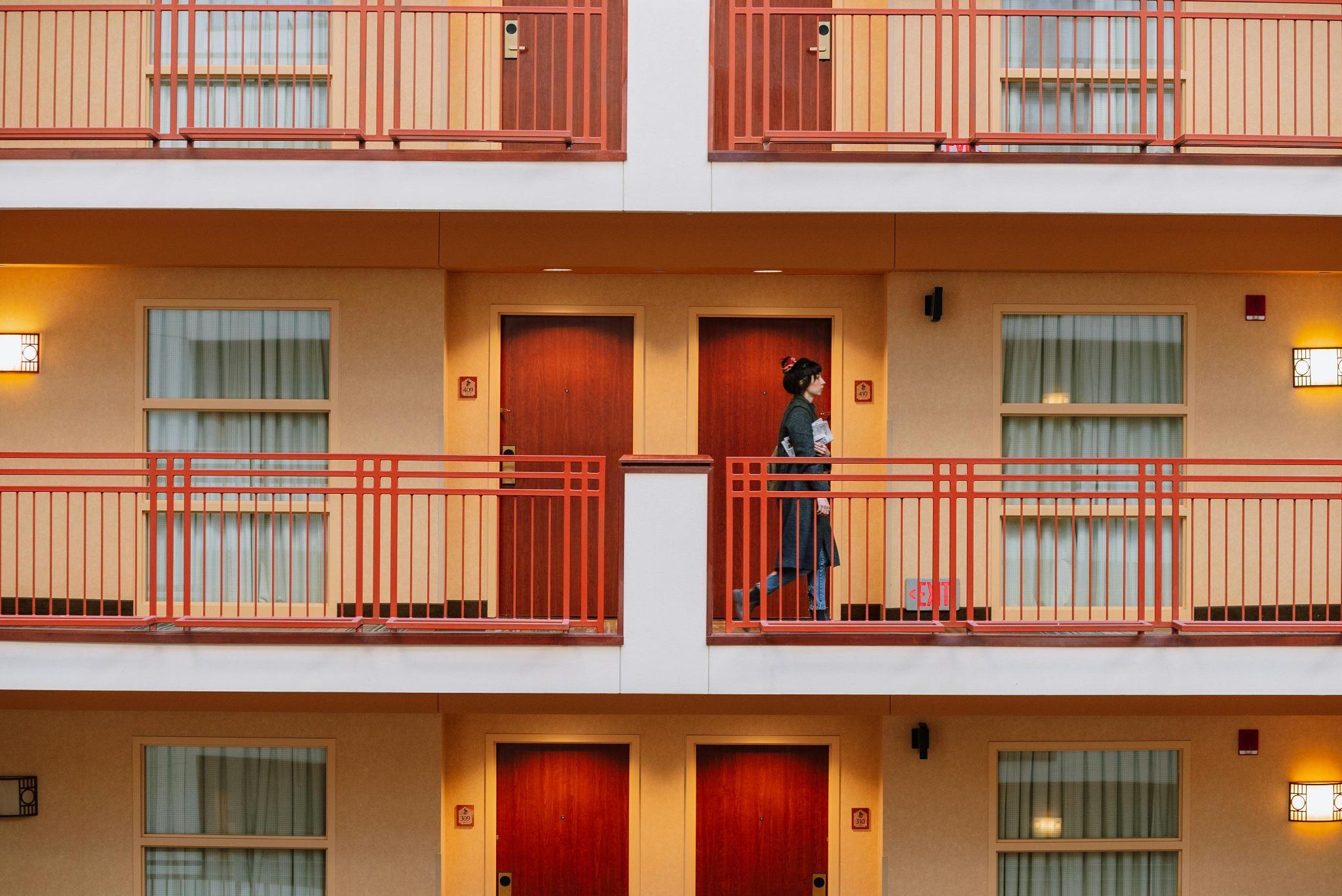 A woman in a multi-unit property
